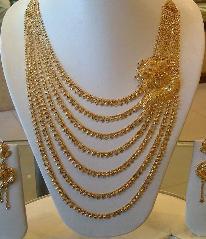 Gold long haar Designs